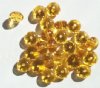 25 6x8mm Faceted Topaz Donut Beads